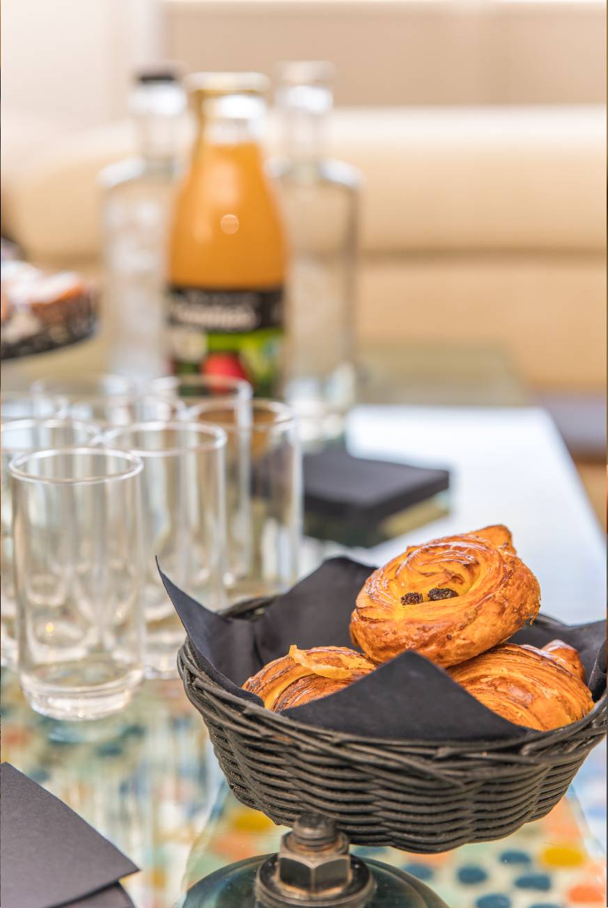 breakfast table with pastries - seminars in brittany